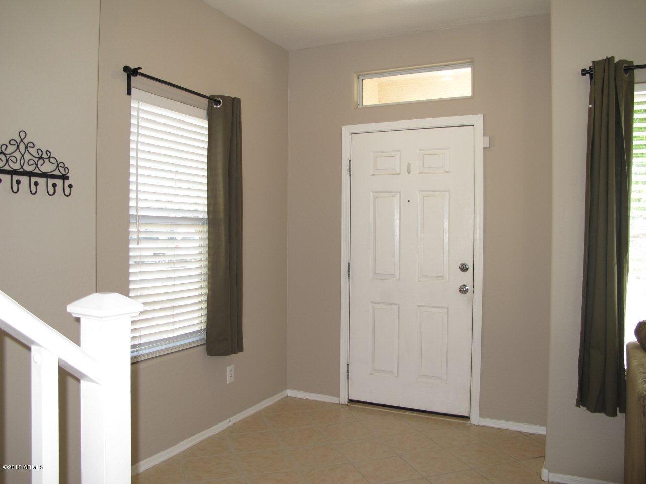 1890 South Rome Street Gilbert, AZ 85295 - Photo 2 of 18 a view of a room that has a window in it