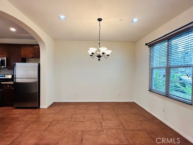 a view of a room with a chandelier