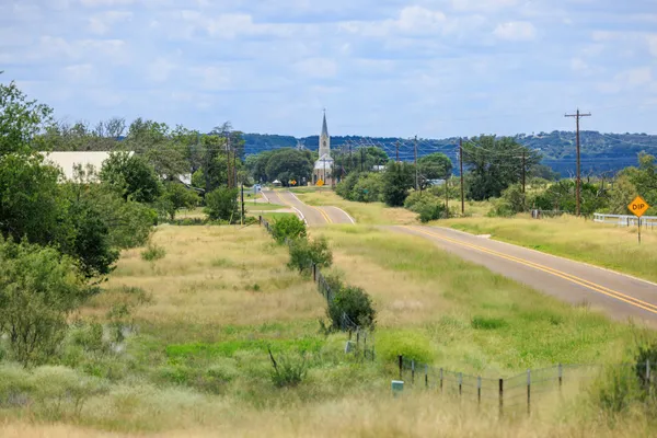 a view of a yard with an trees