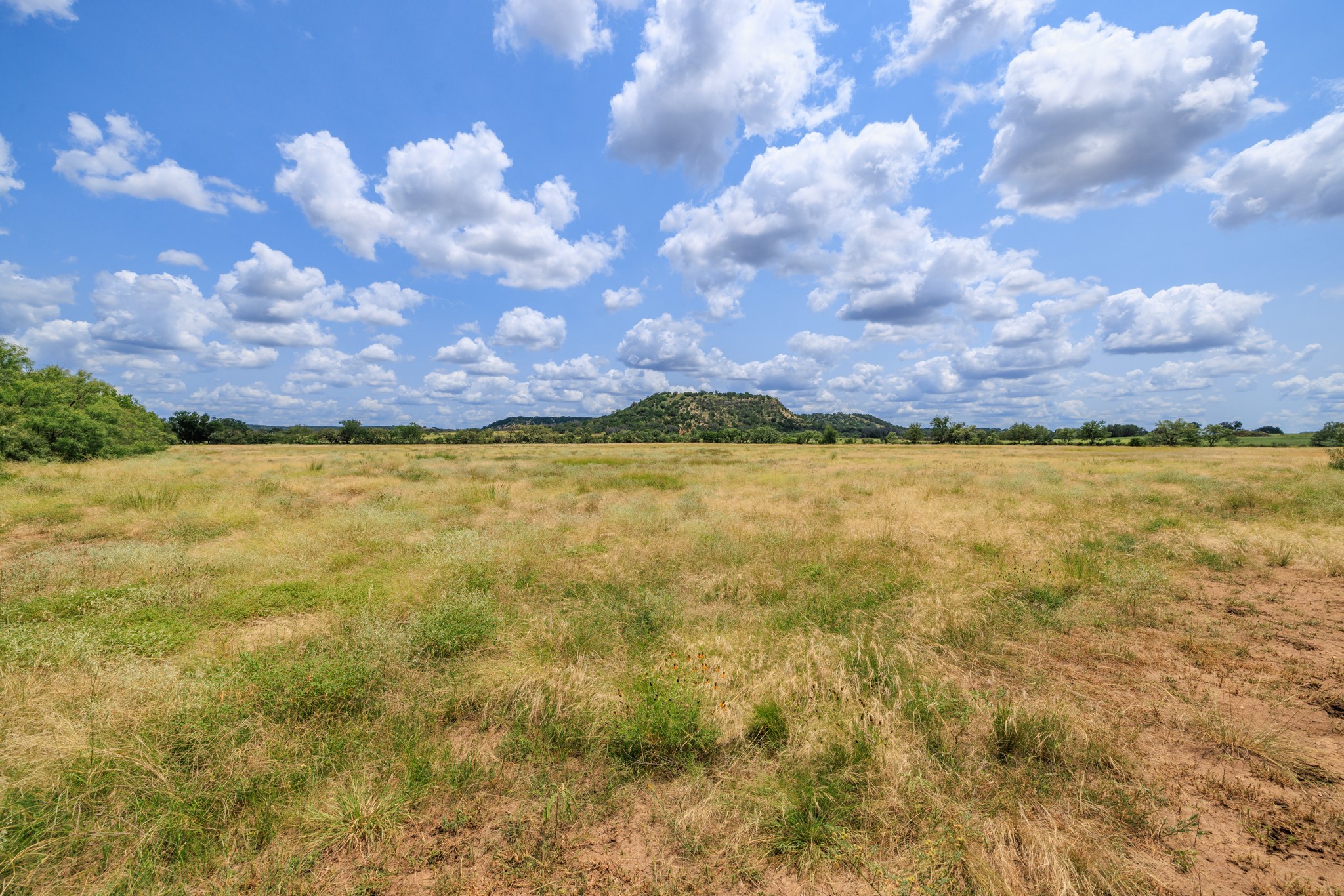 0 Ranch Road 648 Doss, TX 78618 - Photo 8 of 12 a view of a lake and a houses