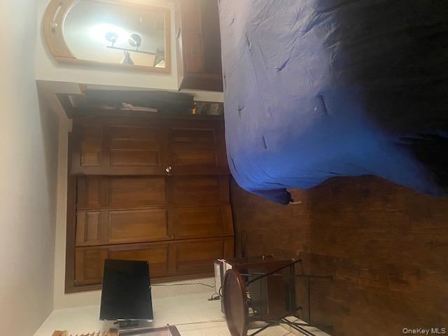 52 Woodland Road Highland Mills, NY 10930 - Photo 38 of 47 Bedroom featuring a closet and dark wood-style flooring