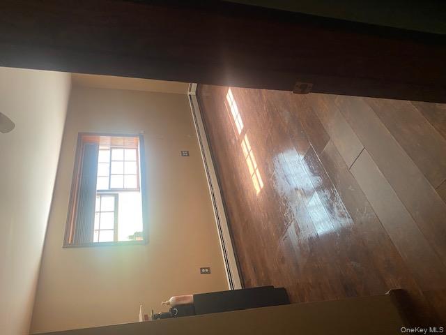 52 Woodland Road Highland Mills, NY 10930 - Photo 42 of 47 Spare room with dark wood-type flooring and baseboard heating