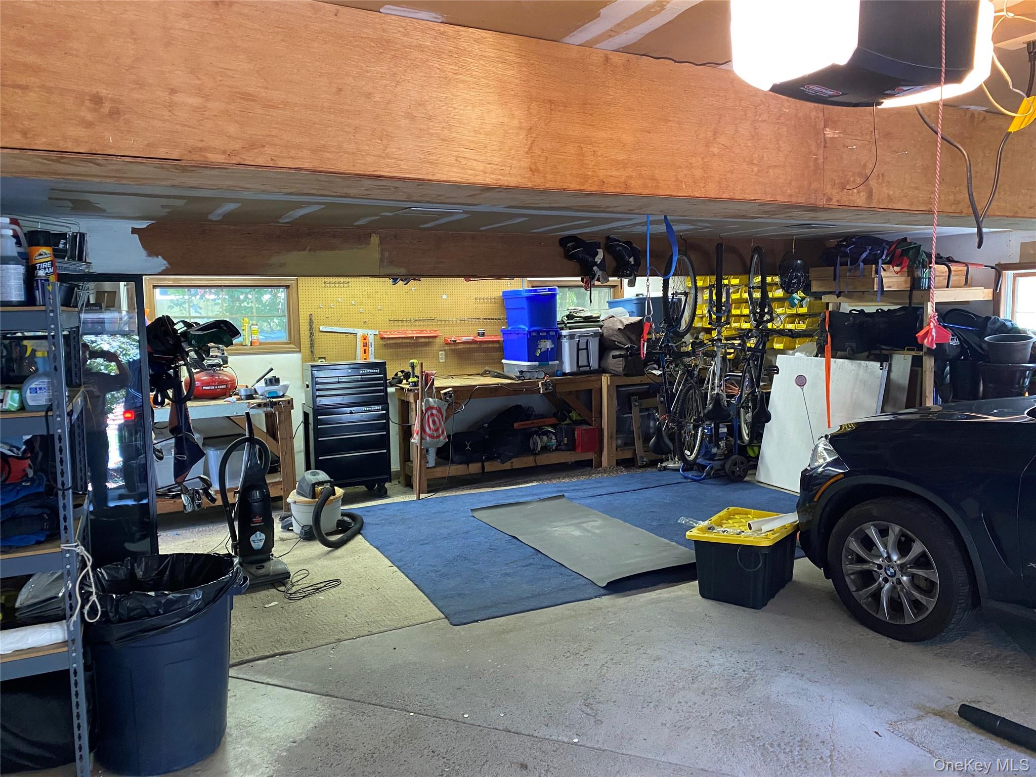 52 Woodland Road Highland Mills, NY 10930 - Photo 44 of 47 Garage featuring a workshop area and a garage door opener