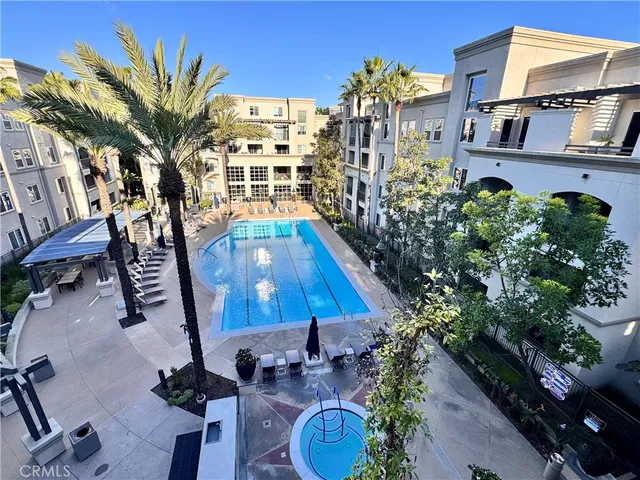 a view of walk in closet with living room