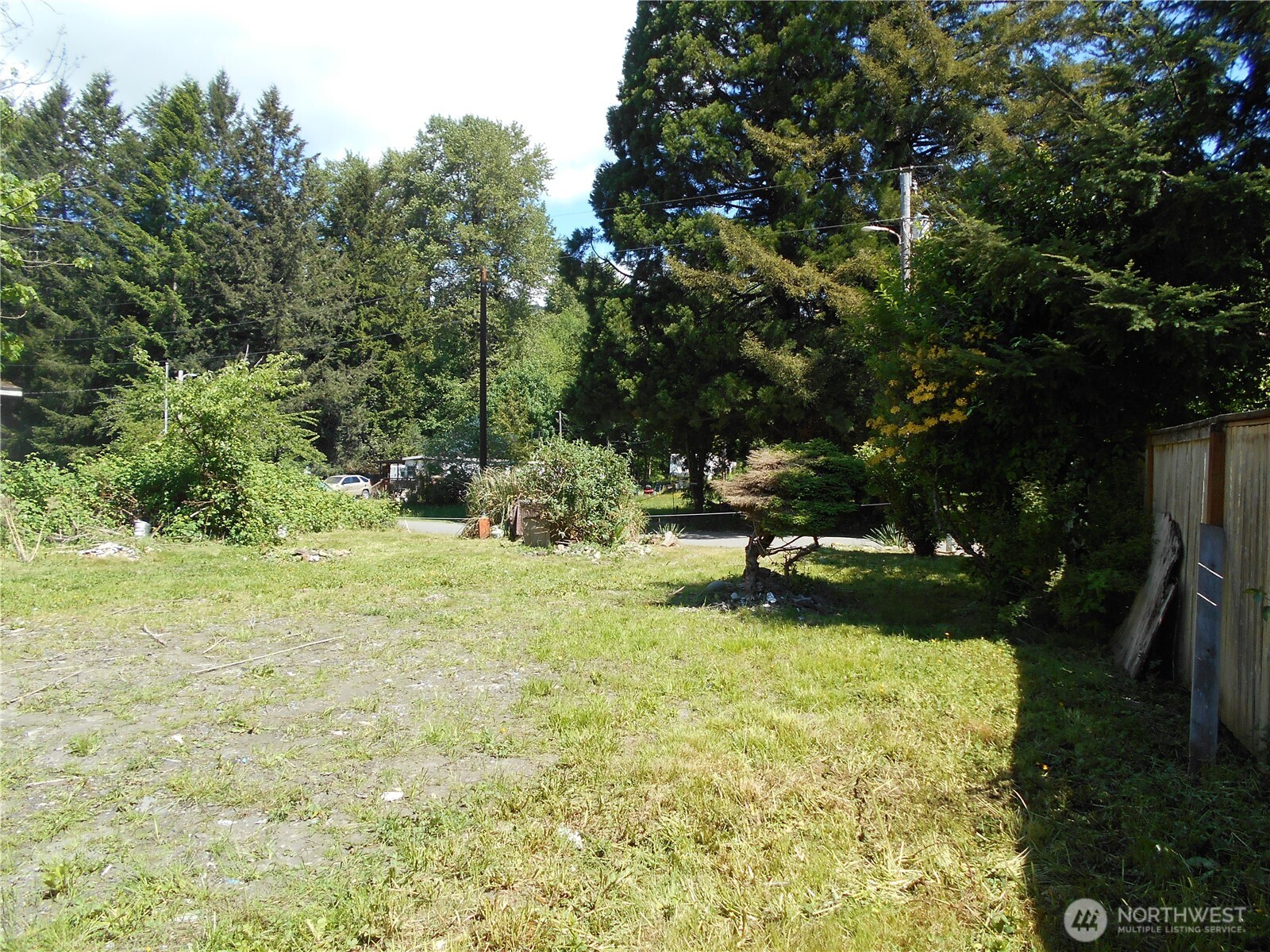 170 Kelly Road Brinnon, WA 98320 - Photo 15 of 29 a view of a garden with a bench