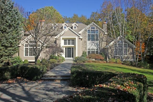12 North Sasco Cmns Westport, CT 06880 - Photo 1 of 1 a front view of a house with a yard