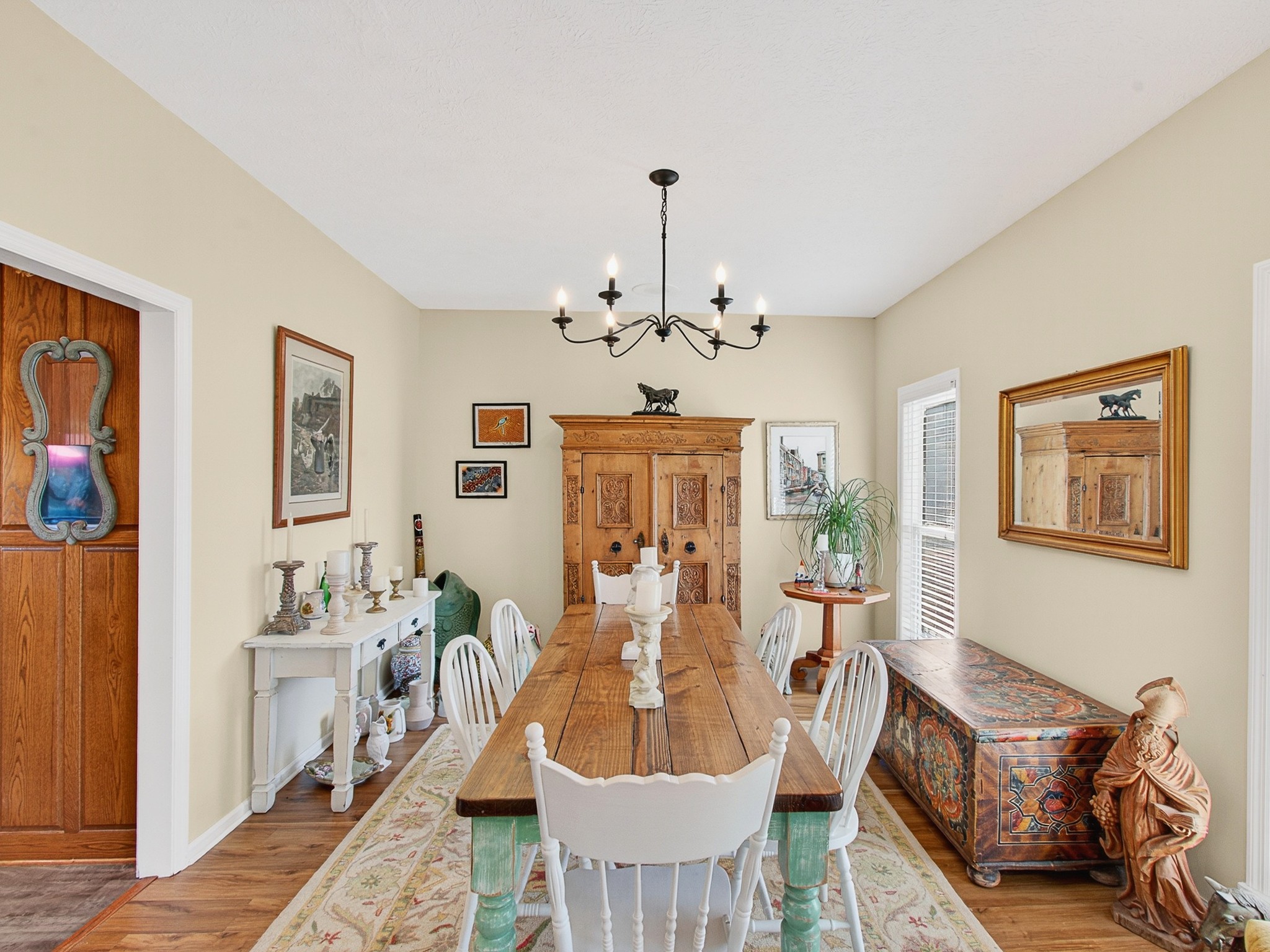 129 Leland Road Summertown, TN 38483 - Photo 27 of 81 a living room with furniture a chandelier and a window