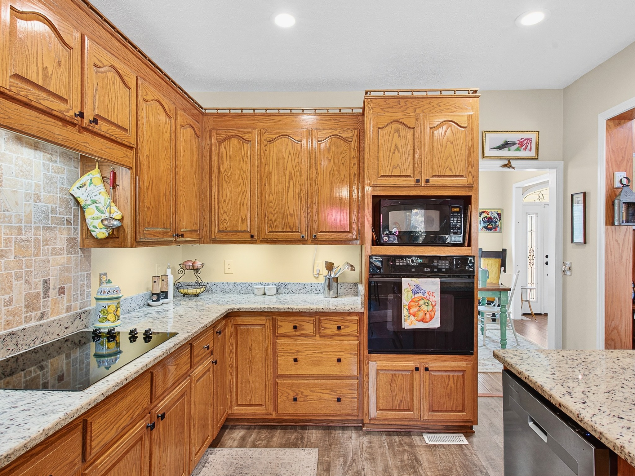 129 Leland Road Summertown, TN 38483 - Photo 41 of 81 a kitchen with stainless steel appliances granite countertop a refrigerator and a stove top oven