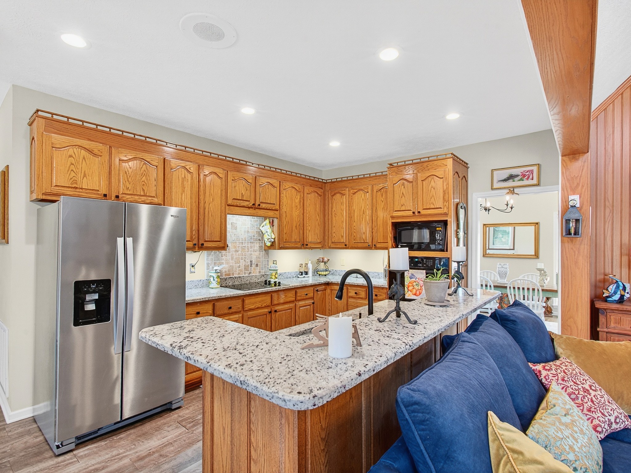 129 Leland Road Summertown, TN 38483 - Photo 42 of 81 a kitchen with stainless steel appliances granite countertop a sink refrigerator and cabinets