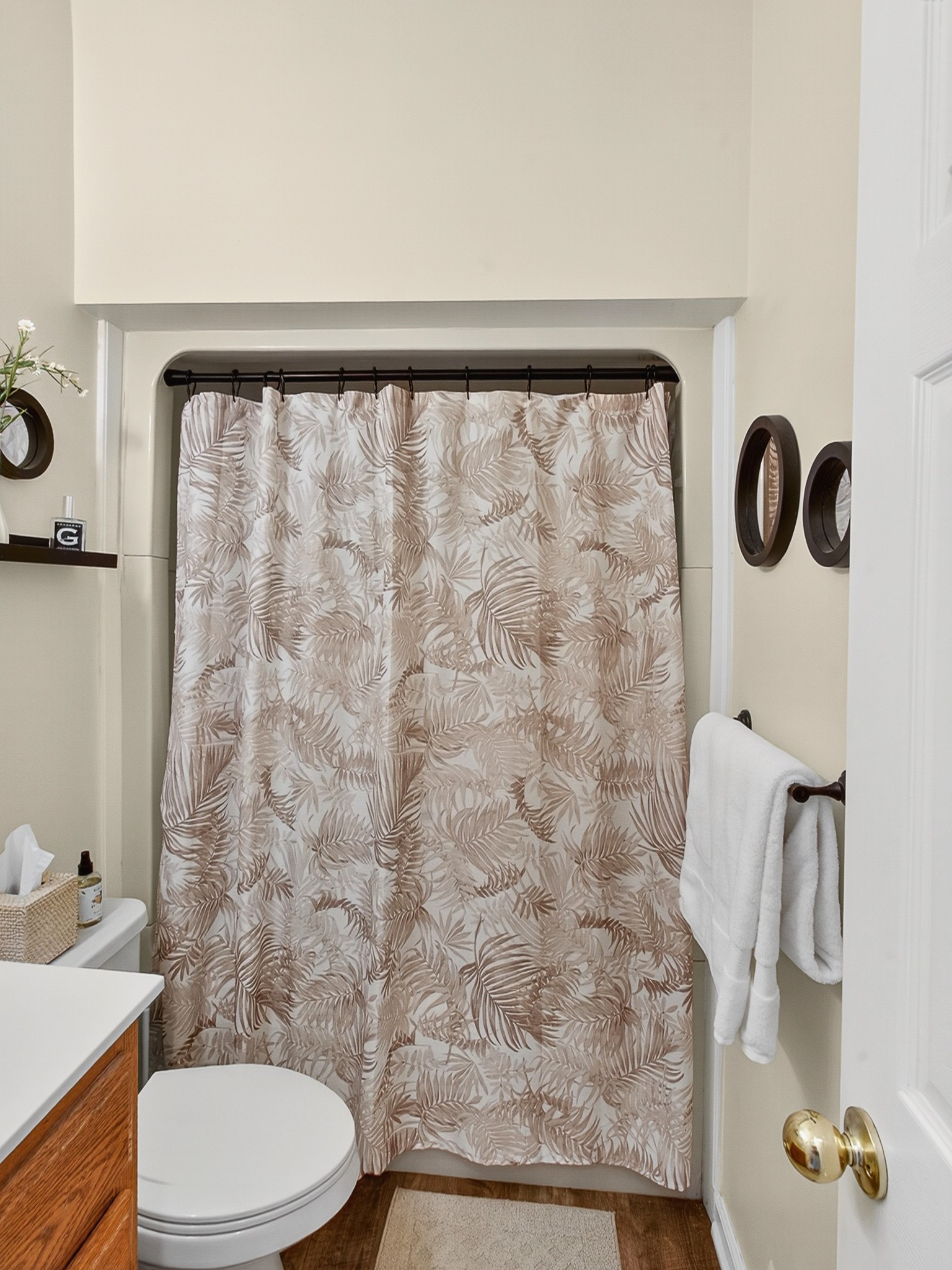 129 Leland Road Summertown, TN 38483 - Photo 52 of 81 a bathroom with a toilet and a shower curtain