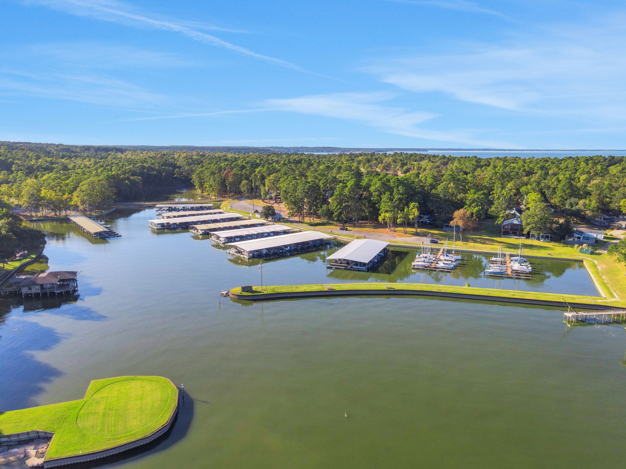 90 Harbour Lane Coldspring, TX 77331 - Photo 28 of 40 Plenty of space along the shoreline and docks to cast a line and enjoy fishing on Lake Livingston.