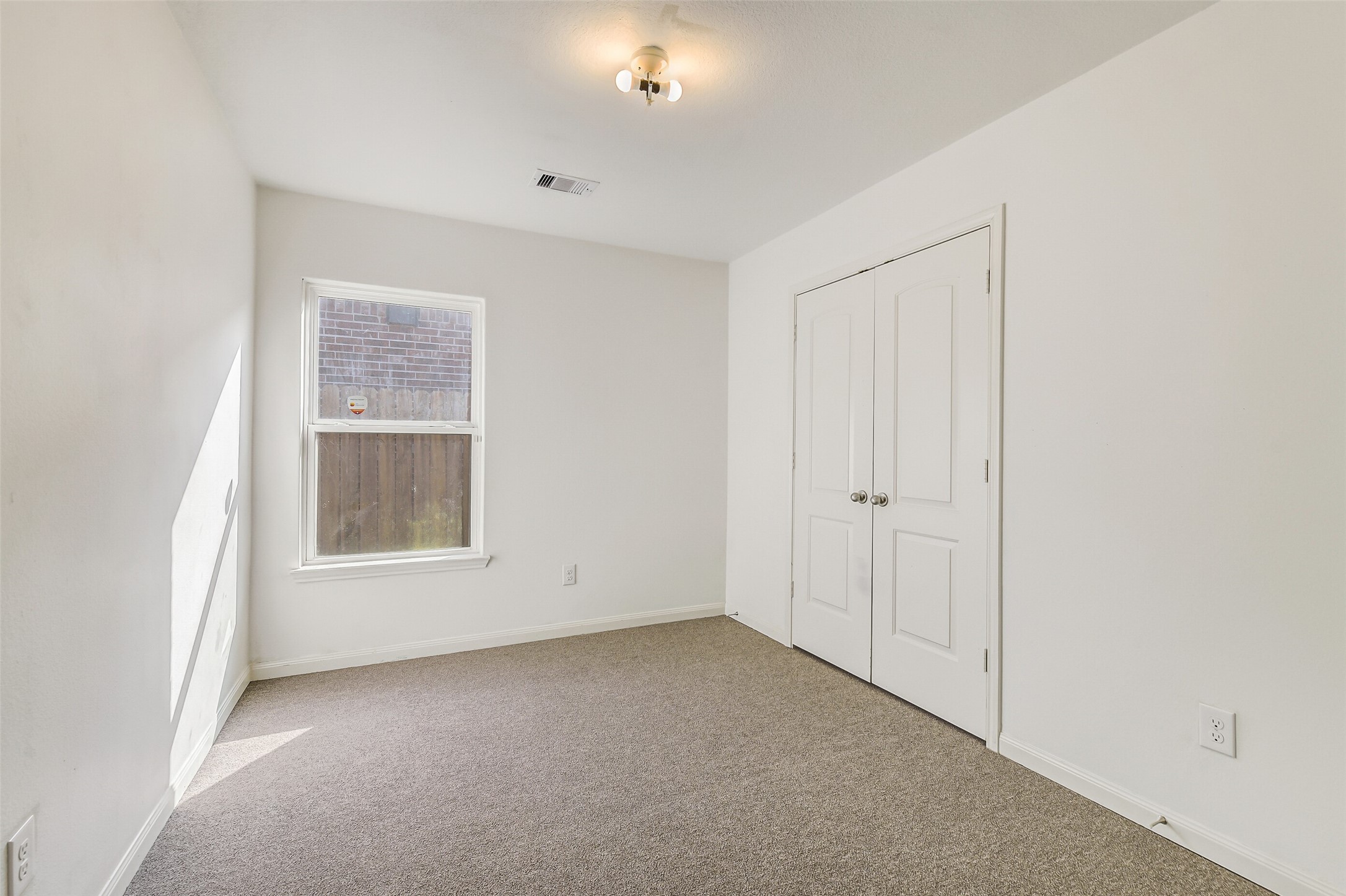 22719 Tabberts Way Hockley, TX 77447 - Photo 22 of 28 an empty room with a window