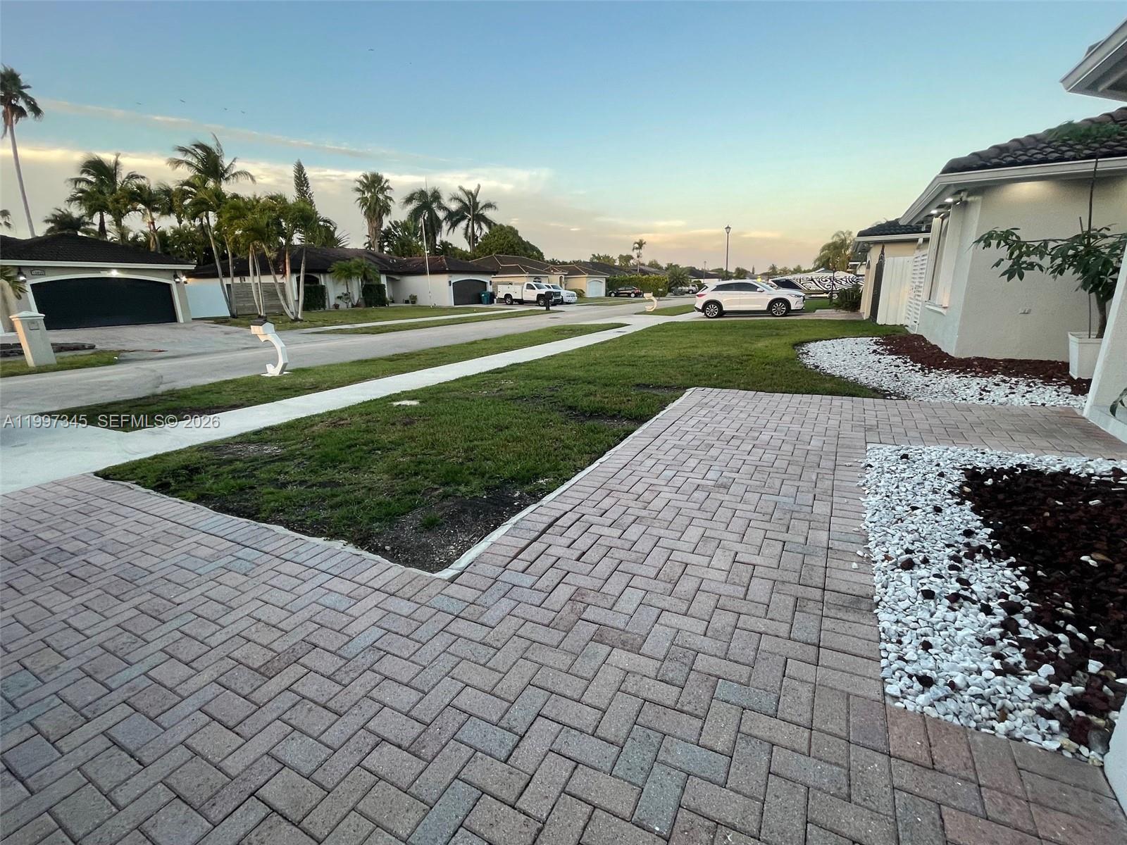 15426 Southwest 168th Terrace, Unit 2 Miami, FL 33187 - Photo 12 of 12 swimming pool view with a outdoor space