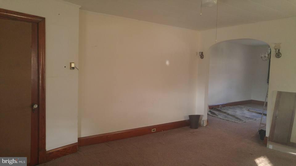 923 Calwell Road Baltimore, MD 21229 - Photo 5 of 14 a view of an empty room