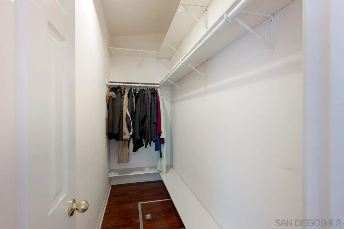 15935 Spring Oaks Road, Unit 122 El Cajon, CA 92021 - Photo 16 of 30 a view of walk in closet with clothes