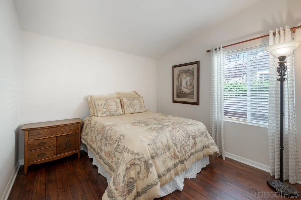 15935 Spring Oaks Road, Unit 122 El Cajon, CA 92021 - Photo 19 of 30 a bedroom with a large bed and a window