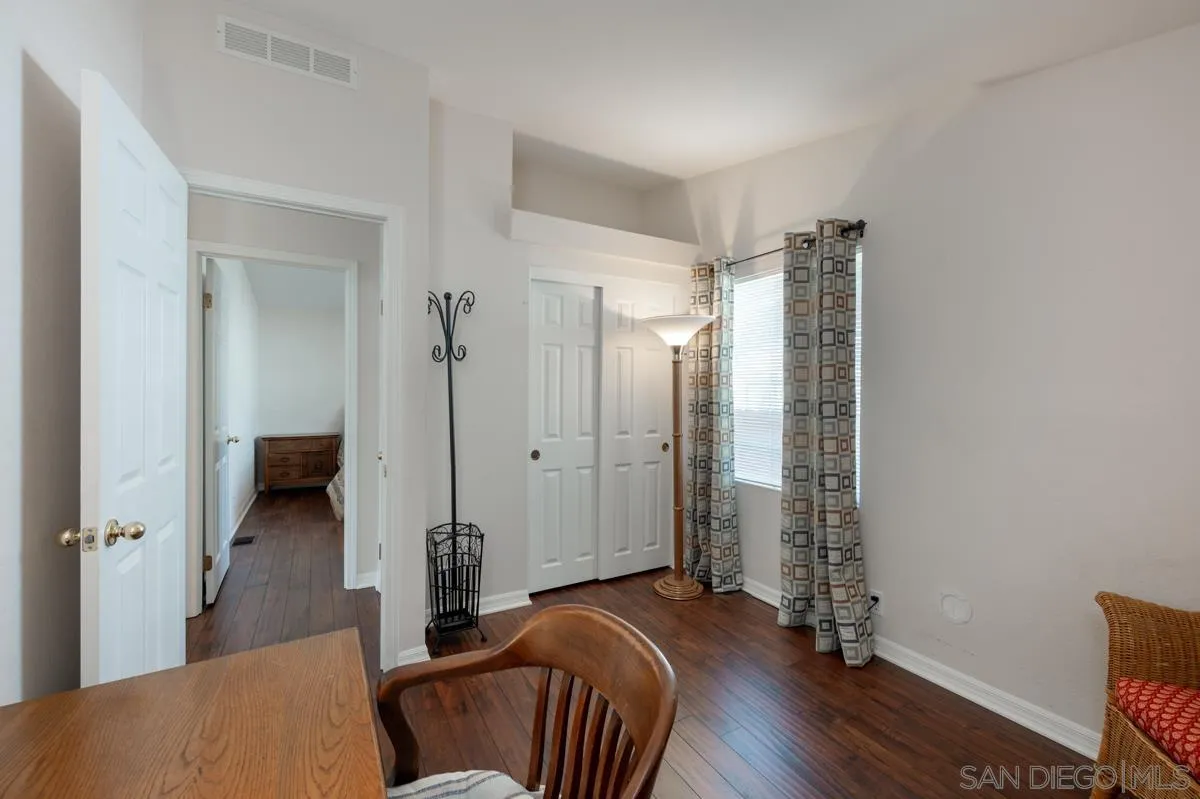 15935 Spring Oaks Road, Unit 122 El Cajon, CA 92021 - Photo 22 of 30 a bedroom with bed and furniture