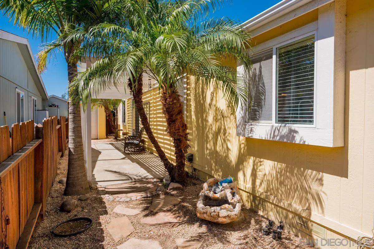 15935 Spring Oaks Road, Unit 122 El Cajon, CA 92021 - Photo 25 of 30 a view of a house with a yard