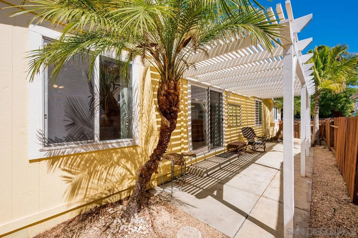 15935 Spring Oaks Road, Unit 122 El Cajon, CA 92021 - Photo 28 of 30 a view of a house with a patio