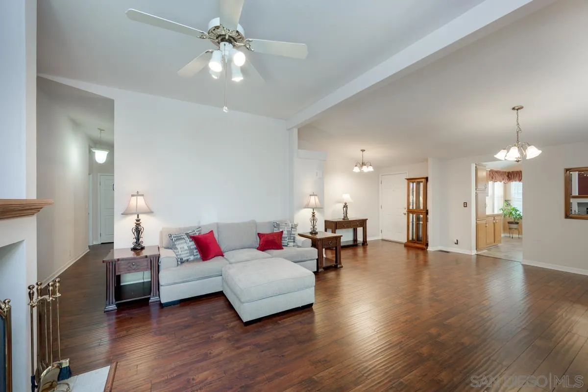 15935 Spring Oaks Road, Unit 122 El Cajon, CA 92021 - Photo 8 of 30 a living room with furniture and wooden floor