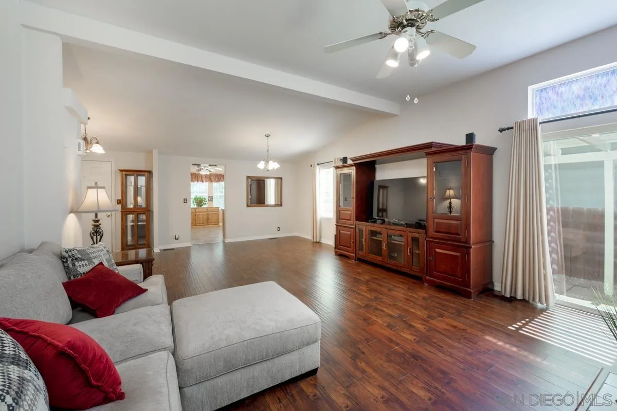 15935 Spring Oaks Road, Unit 122 El Cajon, CA 92021 - Photo 9 of 30 a living room with furniture and a flat screen tv