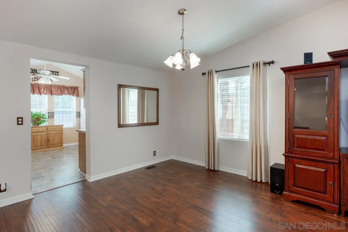 15935 Spring Oaks Road, Unit 122 El Cajon, CA 92021 - Photo 10 of 30 a view of a livingroom with wooden floor