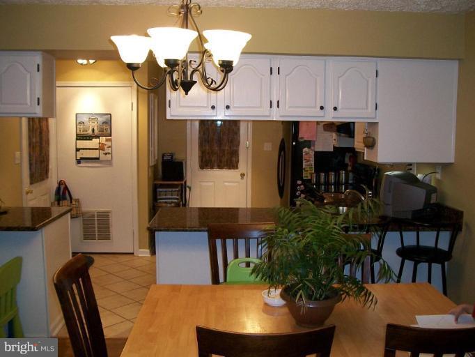 9010 Sudley Road Manassas, VA 20110 - Photo 22 of 25 Kitchen/Dining Room