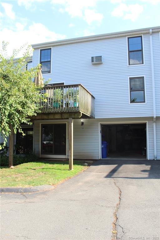a front view of a house with yard