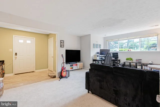 a bedroom with a workspace