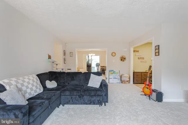 a living room with furniture and a couch