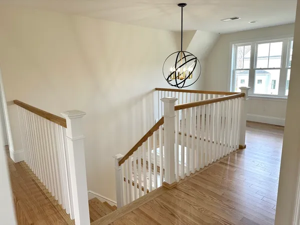 a view of entryway with wooden floor