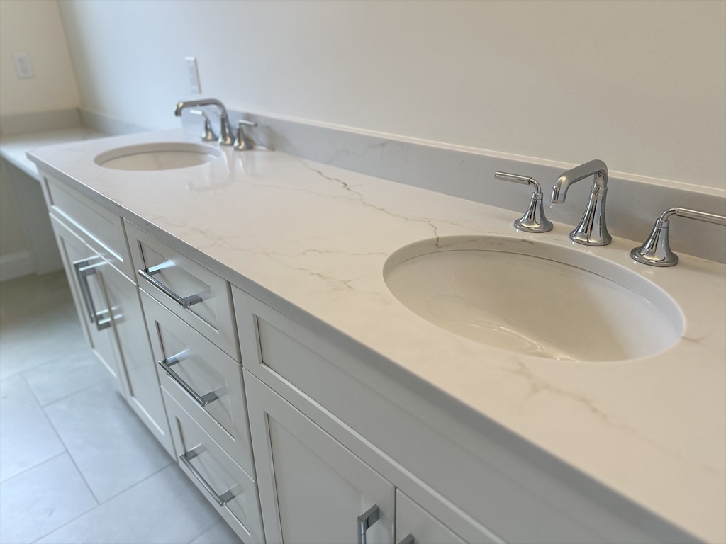 2 Libbey Lane Grafton, MA 01536 - Photo 12 of 18 a bathroom with double vanity sink and a mirror