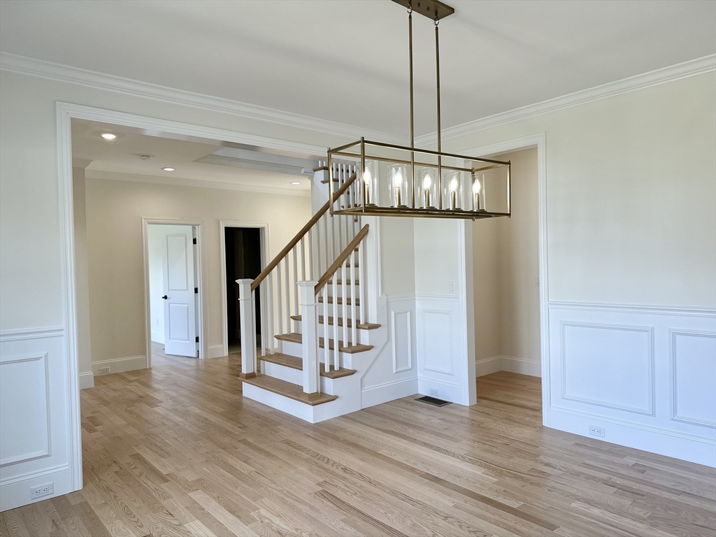 2 Libbey Lane Grafton, MA 01536 - Photo 7 of 18 a view of a hallway with wooden floor and entryway