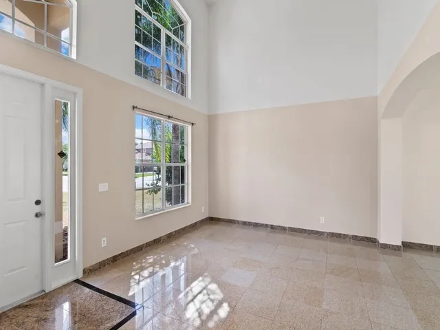 an empty room with windows