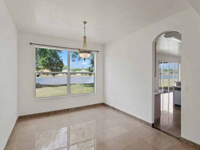 a view of a room that has a window