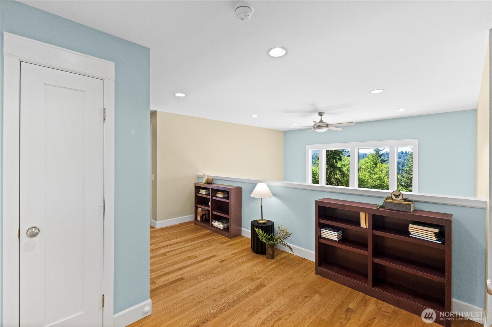 89 Grand View Lane Bellingham, WA 98229 - Photo 17 of 40 a room with furniture and a wooden floor