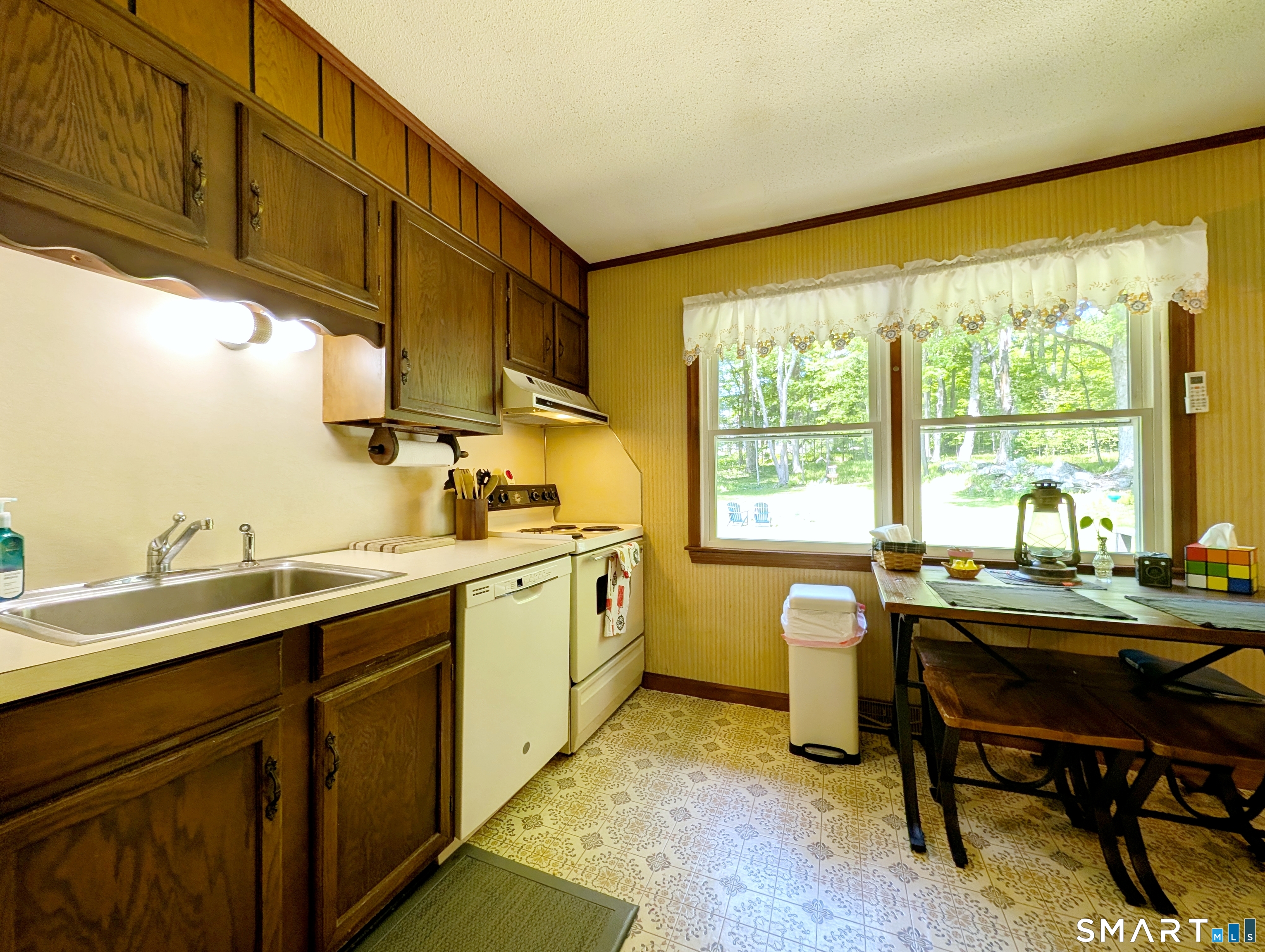 17 Colebrook Road Norfolk, CT 06058 - Photo 13 of 21 a kitchen with a sink cabinets and wooden floor