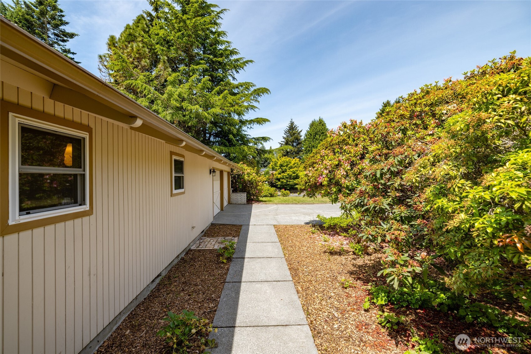 21316 Rolling Ridge Drive Sedro-Woolley, WA 98284 - Photo 3 of 37 a very nice looking yard with patio