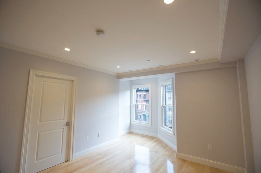 296 Beacon Street, Unit 7 Boston, MA 02116 - Photo 2 of 21 a view of hallway with window