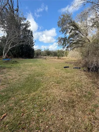 a view of an ocean with a yard