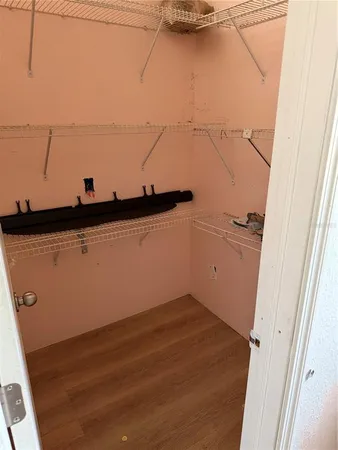 a view of a room with racks on the wall