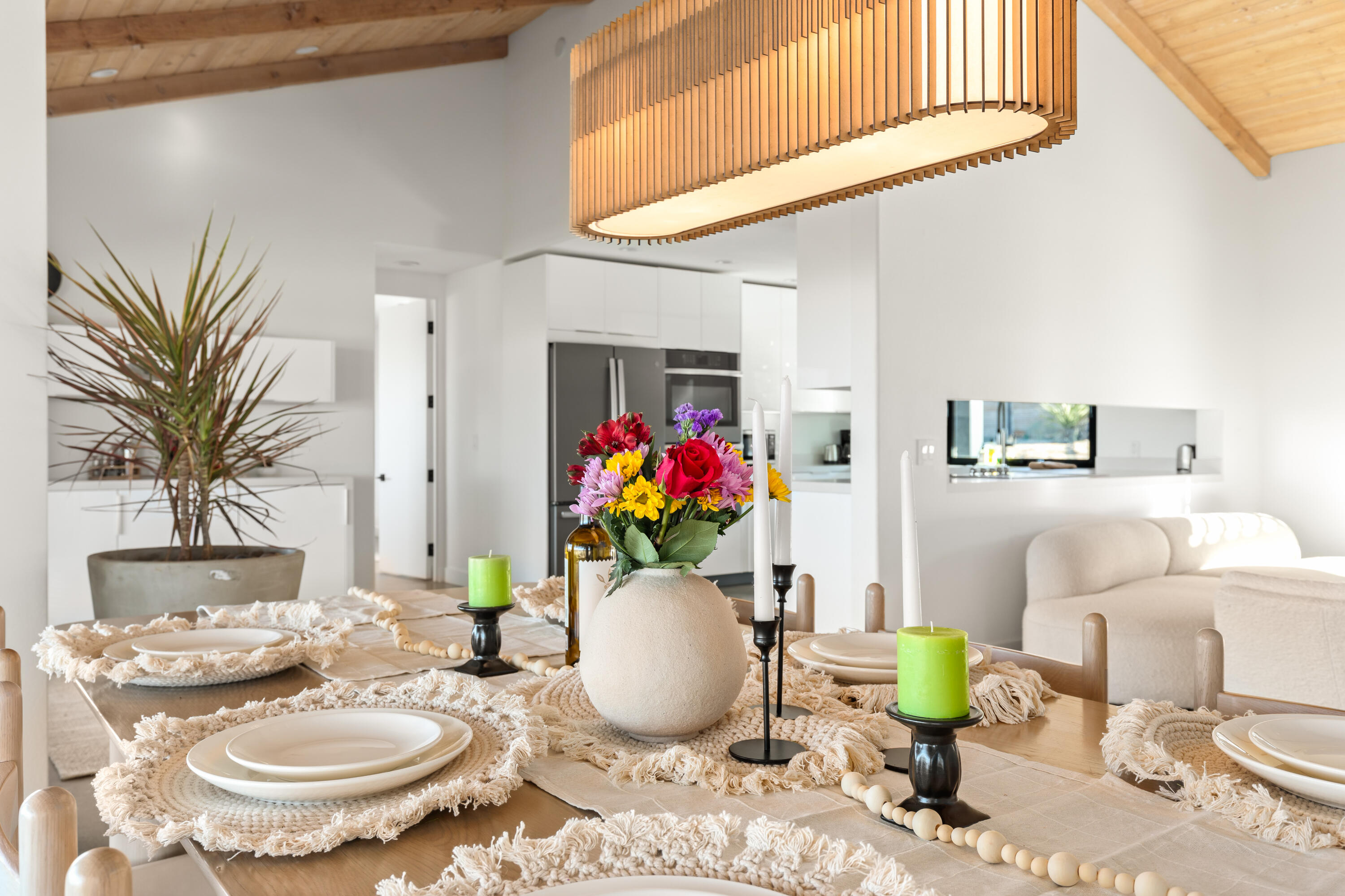 60633 Pueblo Trail Joshua Tree, CA 92252 - Photo 23 of 65 a living room with furniture and a dining room with wooden floor