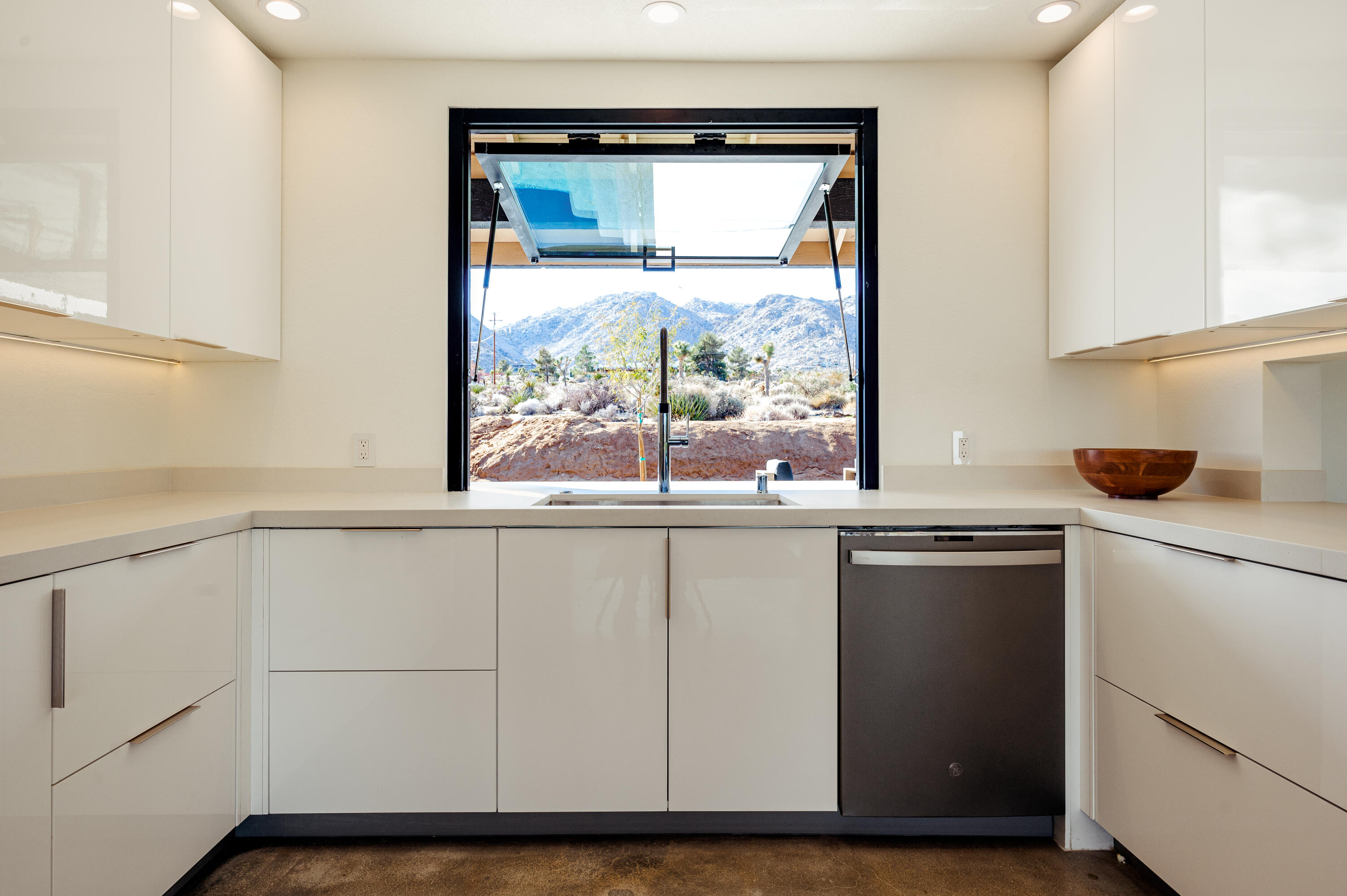 60633 Pueblo Trail Joshua Tree, CA 92252 - Photo 27 of 65 a kitchen with a window a sink and a counter top space