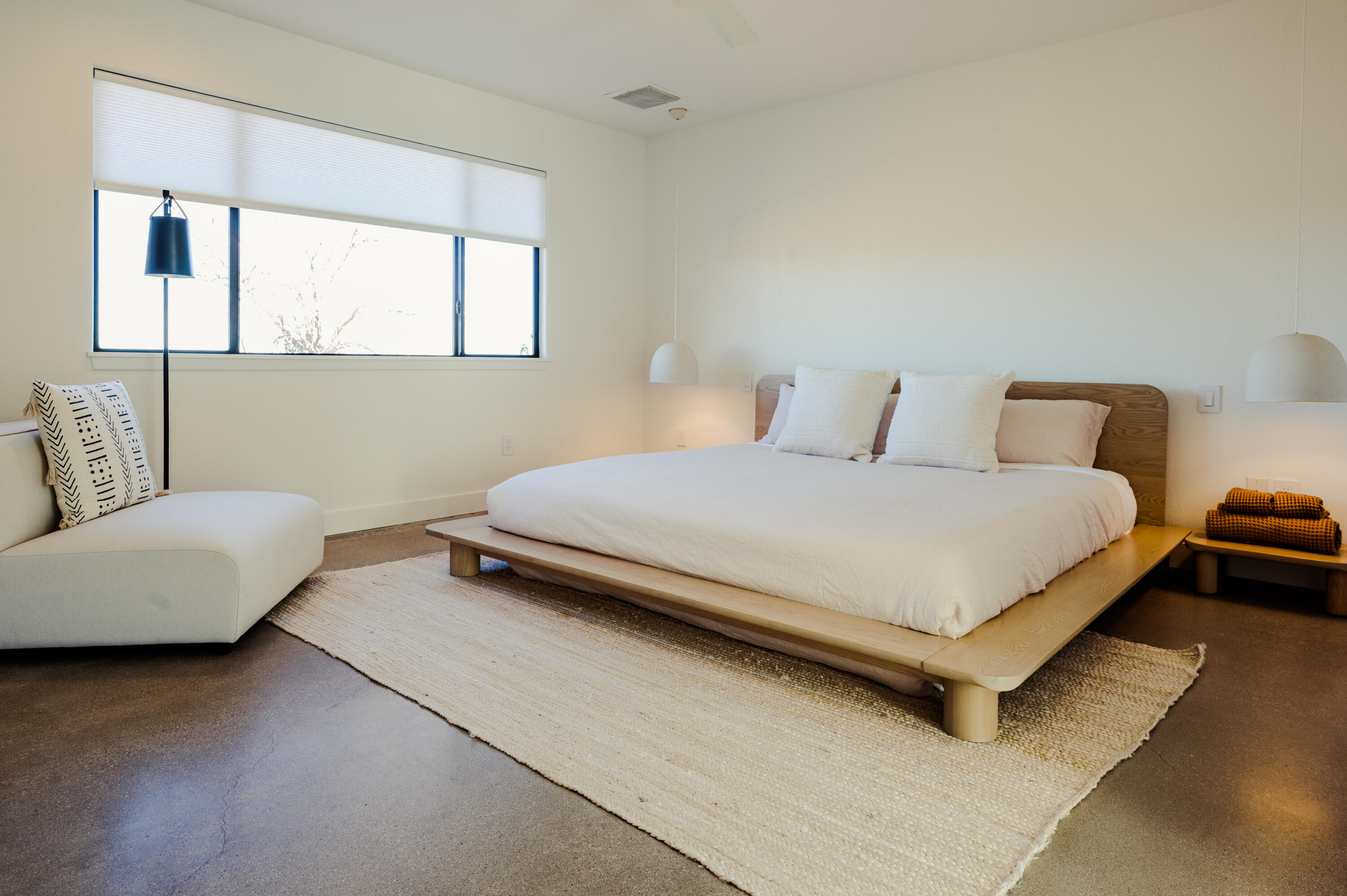 60633 Pueblo Trail Joshua Tree, CA 92252 - Photo 34 of 65 a bedroom with a bed and a couch