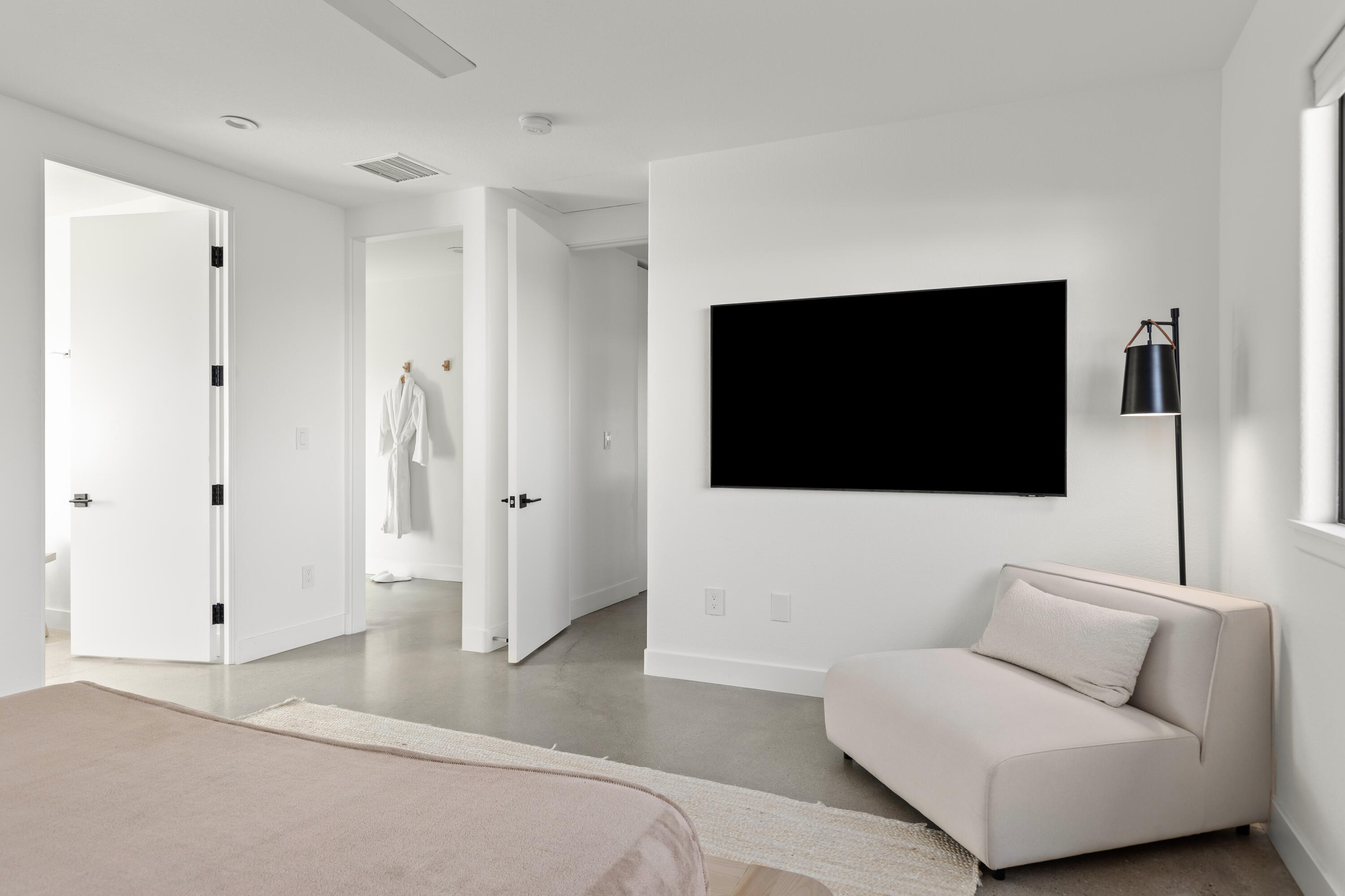 60633 Pueblo Trail Joshua Tree, CA 92252 - Photo 43 of 65 a living room with furniture and a flat screen tv