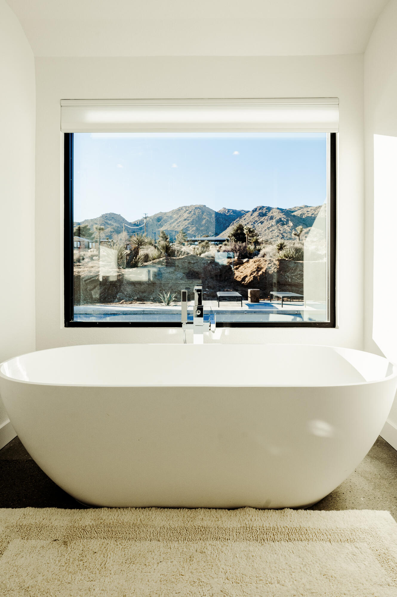 60633 Pueblo Trail Joshua Tree, CA 92252 - Photo 49 of 65 a view of a living room with a large window