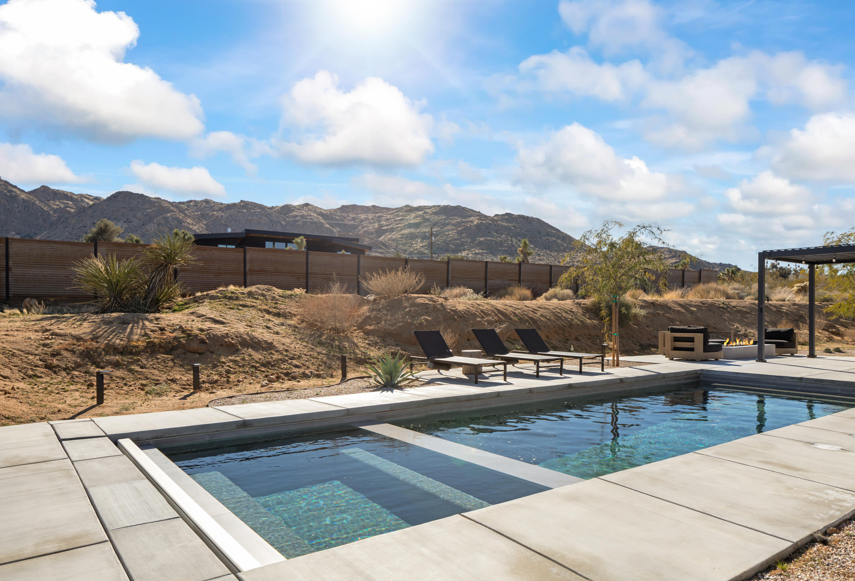 60633 Pueblo Trail Joshua Tree, CA 92252 - Photo 57 of 65 a view of a terrace with sitting area