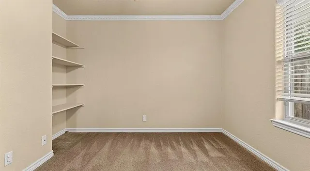 a view of balcony with wooden floor