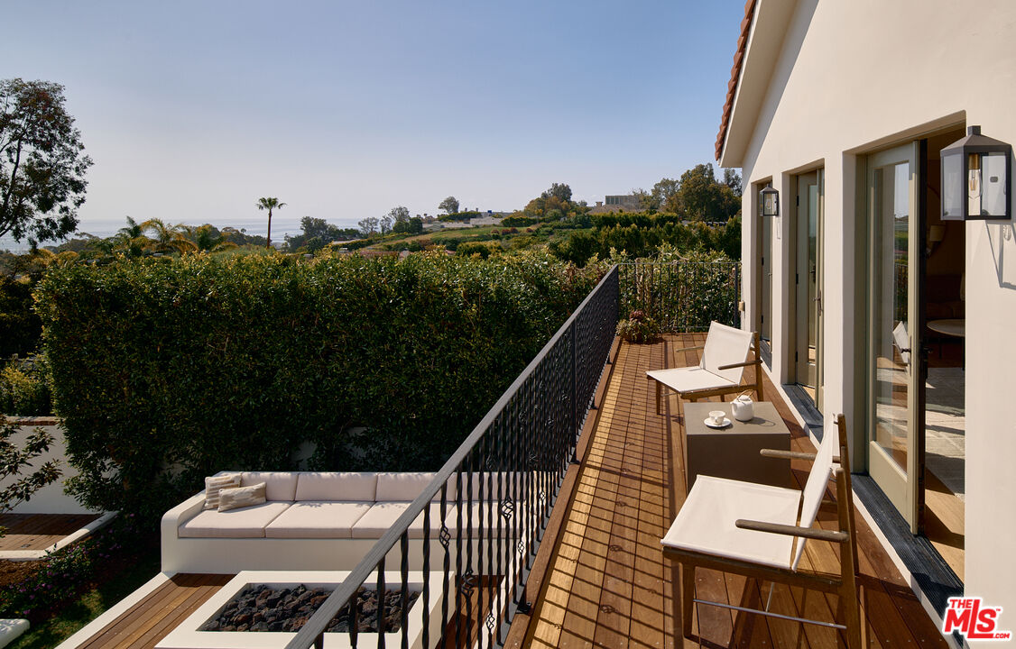 6930 Dume Drive Malibu, CA 90265 - Photo 19 of 34 a view of balcony with furniture