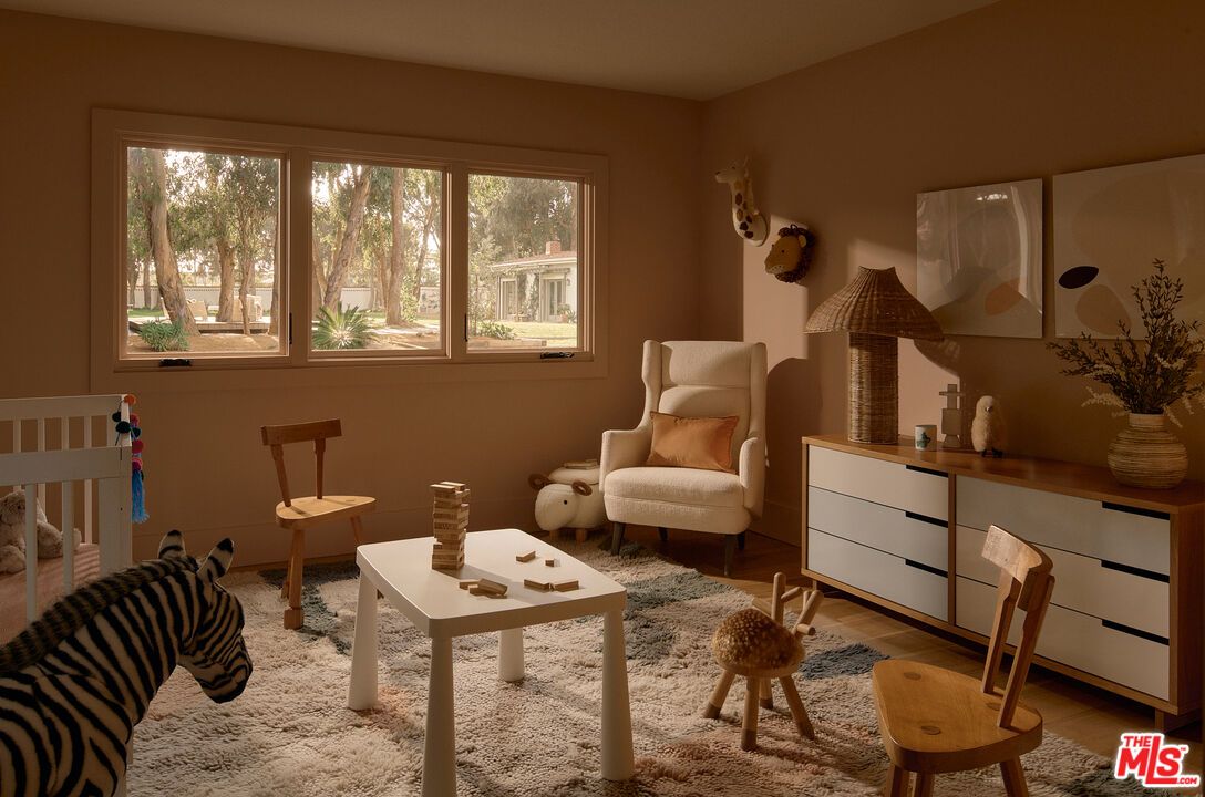 6930 Dume Drive Malibu, CA 90265 - Photo 25 of 34 a living room with furniture and a large window